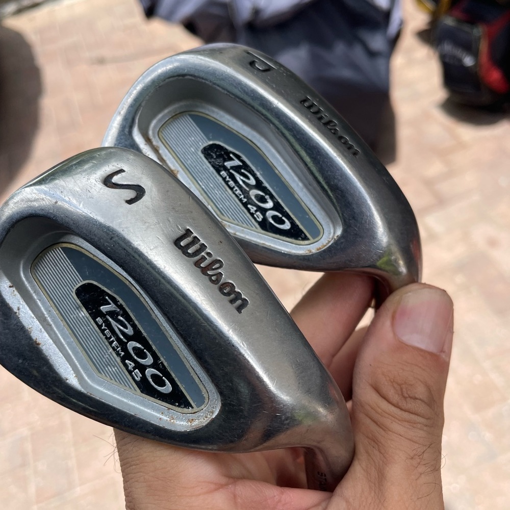 Wilson system 1200 pitching and sand wedge 
Set in right hand